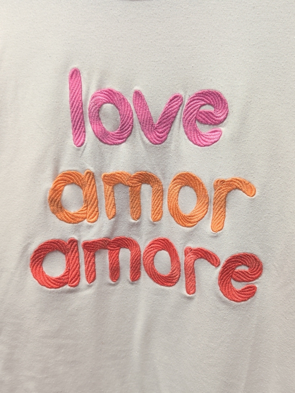 Embroidered "love amor amore" Tee in Pink, Orange, Coral
